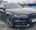 Чорний Ауді А6, об'ємом двигуна 3 л та пробігом 104 тис. км за 19700 $, фото 1 на Automoto.ua