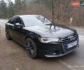 Черный Ауди А6, объемом двигателя 2 л и пробегом 317 тыс. км за 18900 $, фото 1 на Automoto.ua