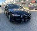Черный Ауди А6, объемом двигателя 2 л и пробегом 303 тыс. км за 21900 $, фото 1 на Automoto.ua