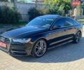 Черный Ауди А6, объемом двигателя 1.98 л и пробегом 200 тыс. км за 17000 $, фото 1 на Automoto.ua
