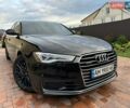 Черный Ауди А6, объемом двигателя 1.98 л и пробегом 199 тыс. км за 16500 $, фото 1 на Automoto.ua