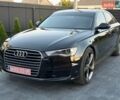 Черный Ауди А6, объемом двигателя 2 л и пробегом 225 тыс. км за 18900 $, фото 1 на Automoto.ua