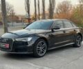 Черный Ауди А6, объемом двигателя 2 л и пробегом 300 тыс. км за 17990 $, фото 1 на Automoto.ua