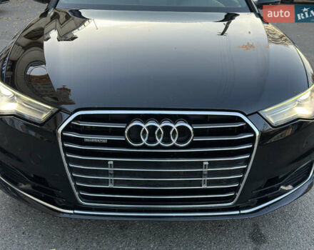 Черный Ауди А6, объемом двигателя 2 л и пробегом 250 тыс. км за 17500 $, фото 1 на Automoto.ua
