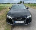 Чорний Ауді А6, об'ємом двигуна 1.98 л та пробігом 165 тис. км за 15500 $, фото 1 на Automoto.ua