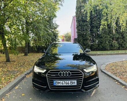 Черный Ауди А6, объемом двигателя 2 л и пробегом 68 тыс. км за 22500 $, фото 1 на Automoto.ua
