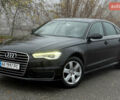 Черный Ауди А6, объемом двигателя 2 л и пробегом 250 тыс. км за 16000 $, фото 1 на Automoto.ua