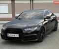 Черный Ауди А6, объемом двигателя 1.98 л и пробегом 115 тыс. км за 21700 $, фото 1 на Automoto.ua