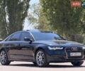 Черный Ауди А6, объемом двигателя 2 л и пробегом 198 тыс. км за 19900 $, фото 1 на Automoto.ua