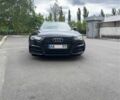 Черный Ауди А6, объемом двигателя 2 л и пробегом 305 тыс. км за 15500 $, фото 1 на Automoto.ua