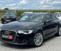 Чорний Ауді А6, об'ємом двигуна 2 л та пробігом 241 тис. км за 20290 $, фото 1 на Automoto.ua