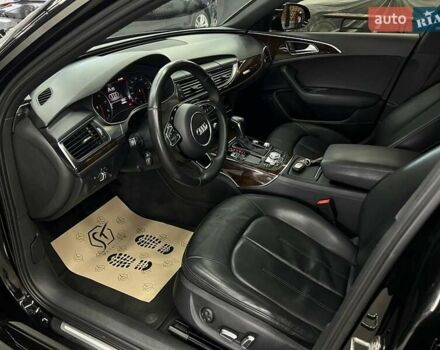 Черный Ауди А6, объемом двигателя 1.98 л и пробегом 148 тыс. км за 24000 $, фото 2 на Automoto.ua