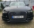Черный Ауди А6, объемом двигателя 1.98 л и пробегом 105 тыс. км за 16000 $, фото 1 на Automoto.ua
