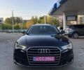 Черный Ауди А6, объемом двигателя 2 л и пробегом 230 тыс. км за 12999 $, фото 1 на Automoto.ua