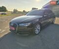Черный Ауди А6, объемом двигателя 1.98 л и пробегом 100 тыс. км за 16450 $, фото 1 на Automoto.ua