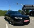 Черный Ауди А6, объемом двигателя 2 л и пробегом 190 тыс. км за 18600 $, фото 1 на Automoto.ua