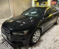 Черный Ауди А6, объемом двигателя 2 л и пробегом 190 тыс. км за 20000 $, фото 1 на Automoto.ua