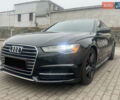 Черный Ауди А6, объемом двигателя 2 л и пробегом 165 тыс. км за 19150 $, фото 1 на Automoto.ua