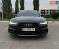 Чорний Ауді А6, об'ємом двигуна 2 л та пробігом 170 тис. км за 23900 $, фото 1 на Automoto.ua