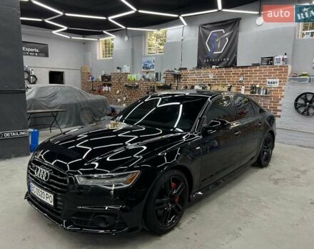 Черный Ауди А6, объемом двигателя 1.98 л и пробегом 148 тыс. км за 24000 $, фото 1 на Automoto.ua