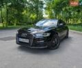 Чорний Ауді А6, об'ємом двигуна 1.98 л та пробігом 118 тис. км за 16899 $, фото 1 на Automoto.ua