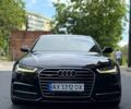 Черный Ауди А6, объемом двигателя 2 л и пробегом 260 тыс. км за 17800 $, фото 1 на Automoto.ua