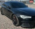 Черный Ауди А6, объемом двигателя 1.98 л и пробегом 220 тыс. км за 14900 $, фото 1 на Automoto.ua
