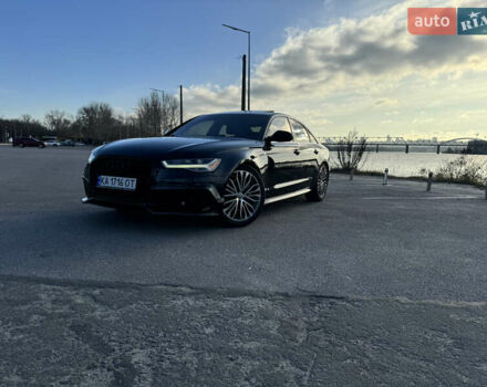 Чорний Ауді А6, об'ємом двигуна 1.98 л та пробігом 140 тис. км за 18500 $, фото 1 на Automoto.ua