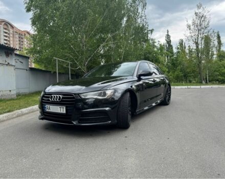 Черный Ауди А6, объемом двигателя 2 л и пробегом 305 тыс. км за 15500 $, фото 1 на Automoto.ua
