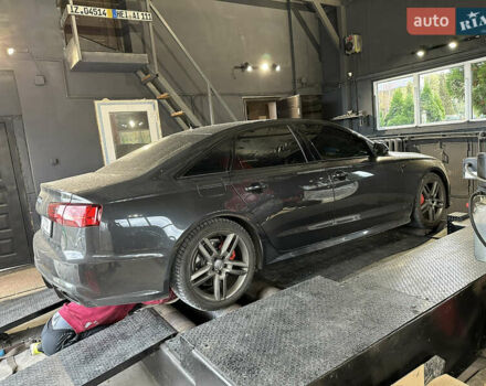 Черный Ауди А6, объемом двигателя 2 л и пробегом 225 тыс. км за 15000 $, фото 2 на Automoto.ua
