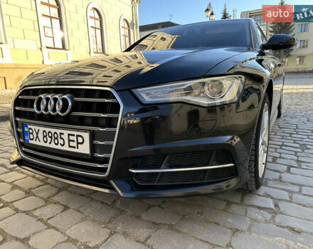 Черный Ауди А6, объемом двигателя 2 л и пробегом 220 тыс. км за 19700 $, фото 1 на Automoto.ua