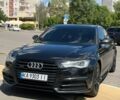 Черный Ауди А6, объемом двигателя 1.98 л и пробегом 220 тыс. км за 17001 $, фото 1 на Automoto.ua