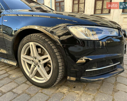 Черный Ауди А6, объемом двигателя 2 л и пробегом 220 тыс. км за 19700 $, фото 10 на Automoto.ua
