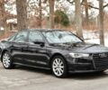 Чорний Ауді А6, об'ємом двигуна 2 л та пробігом 71 тис. км за 12100 $, фото 1 на Automoto.ua