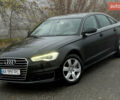 Черный Ауди А6, объемом двигателя 2 л и пробегом 250 тыс. км за 16000 $, фото 1 на Automoto.ua