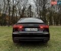 Черный Ауди А6, объемом двигателя 1.97 л и пробегом 106 тыс. км за 23000 $, фото 1 на Automoto.ua