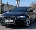 Чорний Ауді А6, об'ємом двигуна 2 л та пробігом 167 тис. км за 23500 $, фото 1 на Automoto.ua