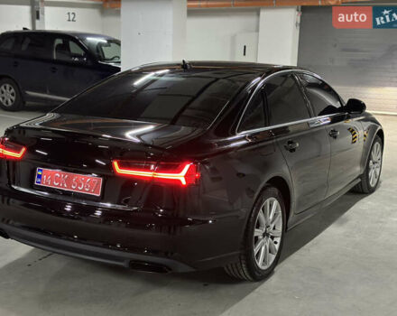Чорний Ауді А6, об'ємом двигуна 2 л та пробігом 259 тис. км за 14300 $, фото 1 на Automoto.ua