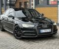Черный Ауди А6, объемом двигателя 1.97 л и пробегом 196 тыс. км за 23000 $, фото 1 на Automoto.ua