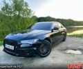 Черный Ауди А6, объемом двигателя 2 л и пробегом 143 тыс. км за 19900 $, фото 1 на Automoto.ua