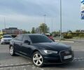 Черный Ауди А6, объемом двигателя 2 л и пробегом 145 тыс. км за 16599 $, фото 1 на Automoto.ua