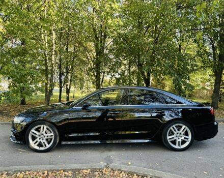 Черный Ауди А6, объемом двигателя 2 л и пробегом 68 тыс. км за 22500 $, фото 2 на Automoto.ua