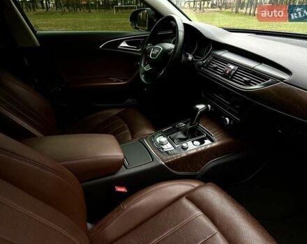 Черный Ауди А6, объемом двигателя 1.97 л и пробегом 106 тыс. км за 23000 $, фото 3 на Automoto.ua