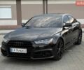Черный Ауди А6, объемом двигателя 1.98 л и пробегом 115 тыс. км за 20500 $, фото 1 на Automoto.ua