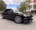 Черный Ауди А6, объемом двигателя 3 л и пробегом 151 тыс. км за 23700 $, фото 1 на Automoto.ua