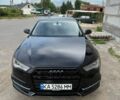 Черный Ауди А6, объемом двигателя 1.98 л и пробегом 105 тыс. км за 15000 $, фото 1 на Automoto.ua