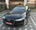 Черный Ауди А6, объемом двигателя 2 л и пробегом 180 тыс. км за 17990 $, фото 2 на Automoto.ua