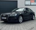 Черный Ауди А6, объемом двигателя 1.98 л и пробегом 119 тыс. км за 18000 $, фото 1 на Automoto.ua
