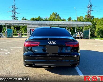 Черный Ауди А6, объемом двигателя 3 л и пробегом 105 тыс. км за 27000 $, фото 1 на Automoto.ua