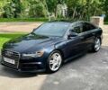 Черный Ауди А6, объемом двигателя 2 л и пробегом 120 тыс. км за 376 $, фото 1 на Automoto.ua
